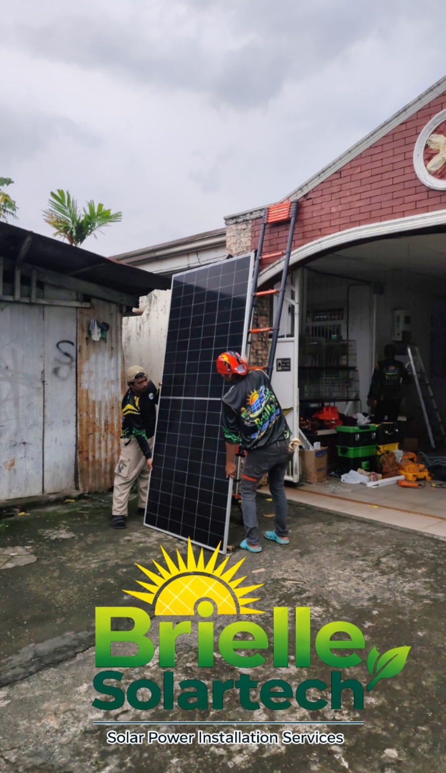 Installer holding a panel outside a residential property