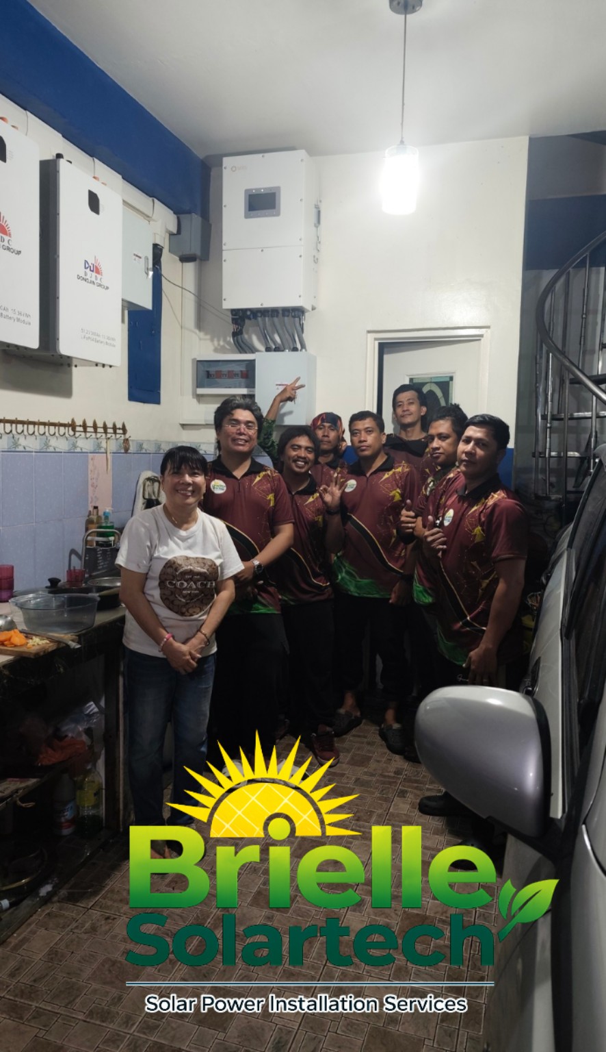 Brielle Solartech team gathered with customers indoors