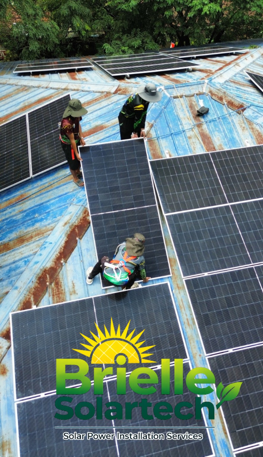 Brielle Solartech team installing panels on a metal roof